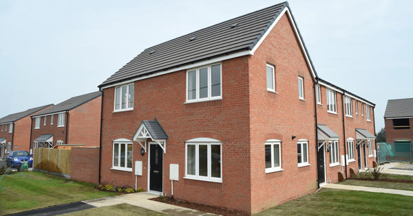 Corner photo showing multiple newly-built homes